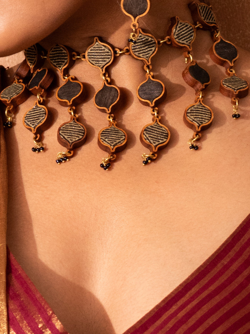 WHE Black and Gold Festive Multi Layered Repurposed Fabric and Wood Necklace